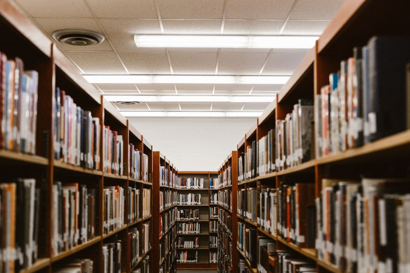 Student preparing for an English language test with study materials
